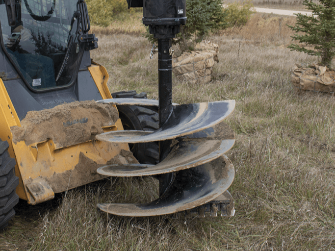 Tackle These 7 Digging Challenges With Your Skid Steer Auger