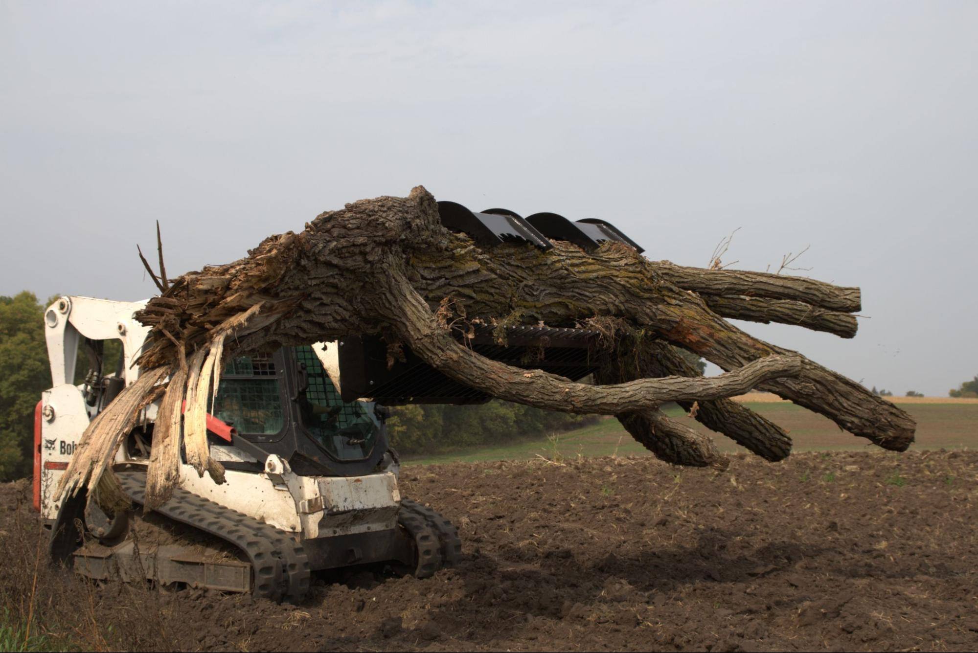 The Ultimate Guide to Skid Steer Attachments: Types, Features, & Tips