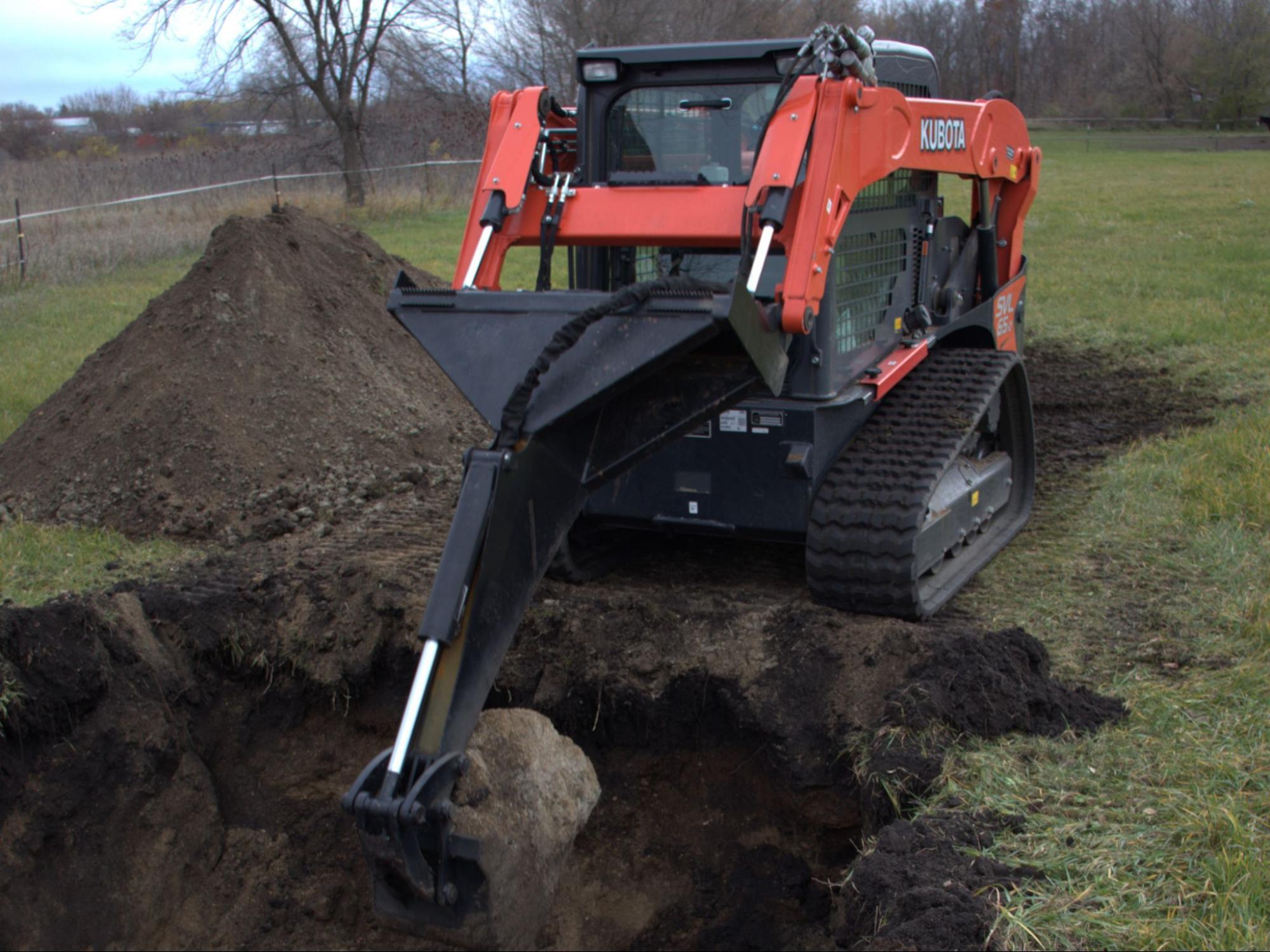 Backhoe vs Excavator: What Makes Sense for Skid Steer Users